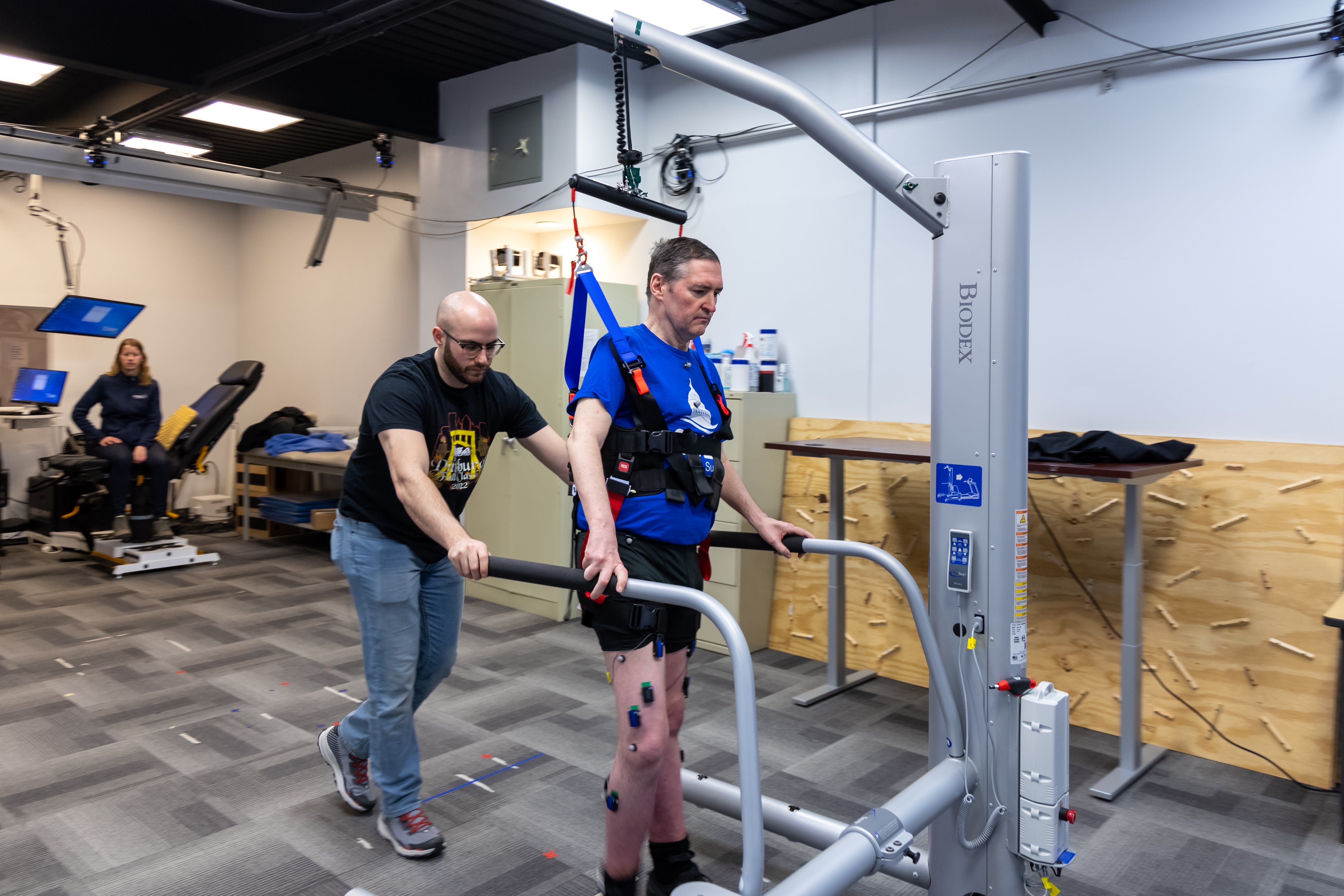 Amy Boos (far left, kinematic occupational therapist), Scott Ensel (middle, graduate student), Doug McCullough (right, study participant) 